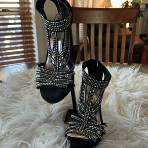 Jennifer Lopez suede sandals with rhinestones.